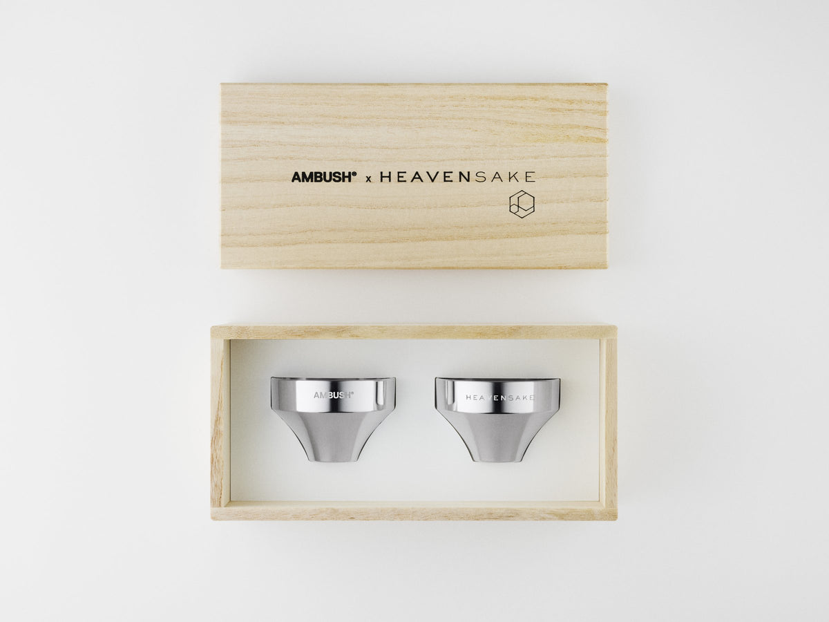 The AMBUSH x HEAVENSAKE tin cups in their wooden box.